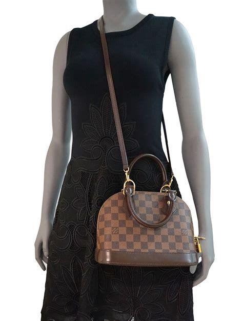 louis vuitton alma bb damier price|lv handbag with braided handle.